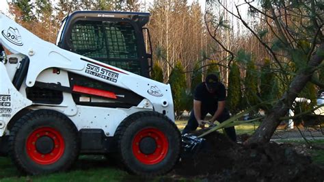 skid steer tree shovel|eterra tree spade skid steer.